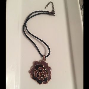 Purple flower pendant necklace